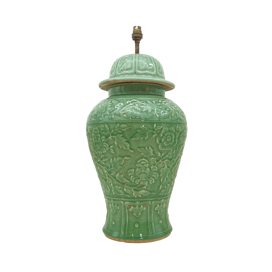 Green tall urn lamp with raised leaf and floral pattern